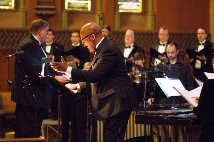 Ron Williams, Baritone as Bishop Christopher Senjonyo & Coro Allegro perform Aluta Continua The passion of David Kato Kisule by Eric Banks.jpg
