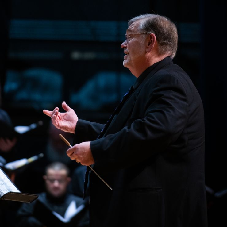 Photo: Artistic Director David Hodgkins conducts Coro Allegro ©Sam Brewer